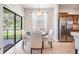 Cozy dining area with sliding glass doors opening to the backyard at 1634 Acadia Harbor Pl, Brandon, FL 33511