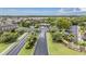 Aerial view of the Brandon Pointe community entrance, featuring lush landscaping at 1634 Acadia Harbor Pl, Brandon, FL 33511