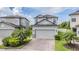 Charming two-story home with brick driveway and well-maintained landscaping at 1634 Acadia Harbor Pl, Brandon, FL 33511