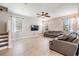Spacious living room with large windows and plush sofas at 1634 Acadia Harbor Pl, Brandon, FL 33511