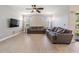 Open living room showcasing neutral tones and natural light at 1634 Acadia Harbor Pl, Brandon, FL 33511