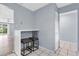 Breakfast nook featuring 2 bar stools, light blue walls, and tile floors at 1706 Belleair Forest Dr # 146, Belleair, FL 33756
