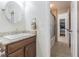 Bathroom featuring a stylish sink and granite counter at 18110 30Th St, Lutz, FL 33559