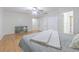 Large bedroom featuring hardwood floors, and ample closet space at 18110 30Th St, Lutz, FL 33559