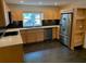 Modern kitchen with stainless steel appliances, sleek countertops, and ample cabinet space at 1861 Harmony Dr, Clearwater, FL 33756
