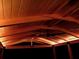 A pergola with ambient overhead lighting and a black ceiling fan at 1861 Harmony Dr, Clearwater, FL 33756