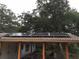 Rooftop solar panels installed on the pergola covered patio at 1861 Harmony Dr, Clearwater, FL 33756