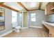 Bathroom featuring a walk-in shower, toilet, and sink vanity at 1912 E 97Th Ave, Tampa, FL 33612