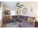 Comfortable living room with large sectional sofa and decorative accents at 1912 E 97Th Ave, Tampa, FL 33612