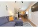 Spacious living room offering an open layout and seamless flow to the kitchen at 1912 E 97Th Ave, Tampa, FL 33612