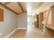 Interior of shed featuring wood-look flooring, shelving, and built-in cabinets at 1912 E 97Th Ave, Tampa, FL 33612