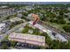 Aerial view showcases community, highlighting the well-manicured grounds at 211 Pasadena N Ave # 109, St Petersburg, FL 33710
