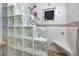 Shower featuring decorative glass block and mosaic tile trim at 211 Pasadena N Ave # 109, St Petersburg, FL 33710