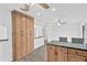 Spacious kitchen with wooden cabinets, breakfast bar and modern appliances at 2325 W Knollwood Pl, Tampa, FL 33604