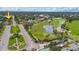 Overhead neighborhood view with landscaped boulevards, a golf course, and waterfront homes in a serene environment at 267 Snell Isle Ne Blvd, St Petersburg, FL 33704
