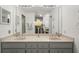 Bathroom featuring double sinks with granite countertop at 2708 W Bird St, Tampa, FL 33614