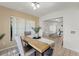 Inviting dining room featuring a light-colored tile floor and a table set for gatherings at 2708 W Bird St, Tampa, FL 33614