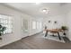 Bright flex-use space has wood-look floors and a backyard view at 2708 W Bird St, Tampa, FL 33614