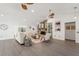 Bright and airy living room featuring a stone fireplace, modern decor, and an open layout at 2708 W Bird St, Tampa, FL 33614