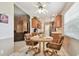 Bright kitchen with stainless steel appliances, wooden cabinetry, and a breakfast nook for everyday meals at 2868 Denmarsh Ct, Palm Harbor, FL 34684