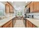 Spacious kitchen includes stainless appliances, ample cabinets, and adjacent eat-in breakfast area at 2868 Denmarsh Ct, Palm Harbor, FL 34684