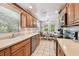 View of the kitchen with lots of storage, modern appliances, and breakfast nook at 2868 Denmarsh Ct, Palm Harbor, FL 34684