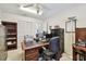 Office space featuring desk, office chair, printer, and filing cabinet at 2868 Denmarsh Ct, Palm Harbor, FL 34684