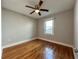 A basic bedroom featuring a ceiling fan and wood floors at 3018 11Th N Ave, St Petersburg, FL 33713