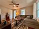 Spacious living room with hardwood floors and ample seating, perfect for entertaining at 3018 11Th N Ave, St Petersburg, FL 33713