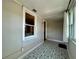 Bright sun room featuring patterned tile and paneled walls at 3018 11Th N Ave, St Petersburg, FL 33713