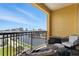 A cozy condo balcony with seating and city views at 345 Bayshore Blvd # 1510, Tampa, FL 33606