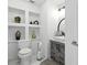 Stylish half bathroom with patterned tile, modern vanity and toilet at 345 Bayshore Blvd # 1510, Tampa, FL 33606
