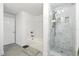 This bathroom features a shower with pebble floor, as well as a garden tub with tile surround at 345 Bayshore Blvd # 1510, Tampa, FL 33606