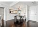 Dining area with hardwood floors, modern chandelier, and stylish round table at 345 Bayshore Blvd # 1510, Tampa, FL 33606