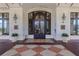 Elegant building entrance with decorative tile flooring and lush potted plants at 345 Bayshore Blvd # 1510, Tampa, FL 33606