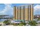 High-rise building featuring a vibrant yellow facade and balconies, nestled near waterfront and city views at 345 Bayshore Blvd # 1510, Tampa, FL 33606