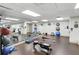 Spacious gym with weights, rowing machine, and mirrored wall at 345 Bayshore Blvd # 1510, Tampa, FL 33606