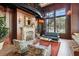 Cozy lobby area with a fireplace, spiral staircase, and warm wood accents at 345 Bayshore Blvd # 1510, Tampa, FL 33606