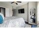 Main bedroom with mounted TV, mirror and plush bed with accent pillows at 345 Bayshore Blvd # 1510, Tampa, FL 33606