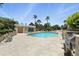 An outdoor pool with surrounding lounge area and a grill at 345 Bayshore Blvd # 1510, Tampa, FL 33606