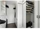 This walk-in closet has a floor to ceiling shoe rack and custom shelving for optimal organization at 345 Bayshore Blvd # 1510, Tampa, FL 33606