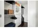 This walk-in closet has custom shelving and drawers to maximize storage and organization at 345 Bayshore Blvd # 1510, Tampa, FL 33606