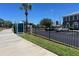 Street view of a neighborhood building with a bus stop and sidewalk at 3535 41St S Ter # 219, St Petersburg, FL 33701