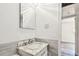 Bathroom featuring a marble-top vanity and modern fixtures at 3601 27Th S Ave, St Petersburg, FL 33711