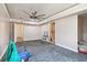 Spacious bedroom with ceiling fan, carpet and doors to hallway and bath at 3601 27Th S Ave, St Petersburg, FL 33711