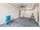 Spacious bedroom with ceiling fan, carpet and doors to hallway and bath at 3601 27Th S Ave, St Petersburg, FL 33711