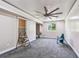 Spacious bedroom with ceiling fan, carpet and doors to hallway and bath at 3601 27Th S Ave, St Petersburg, FL 33711