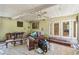 Covered patio features tile flooring, ceiling fans, and outdoor access to the yard at 3601 27Th S Ave, St Petersburg, FL 33711