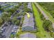 Aerial view of townhome complex with parking, landscaping, and water access at 367 Countryside Key Blvd, Oldsmar, FL 34677