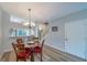 Dining room with views of an eat-in kitchen and open staircase at 367 Countryside Key Blvd, Oldsmar, FL 34677
